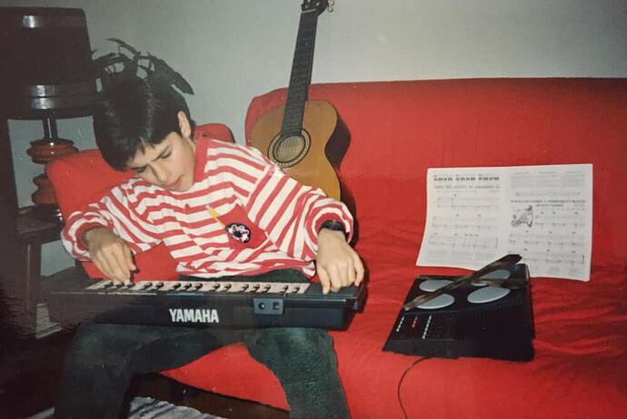 Tiago playing on a Yamaha Portasound PSS-140 keyboard